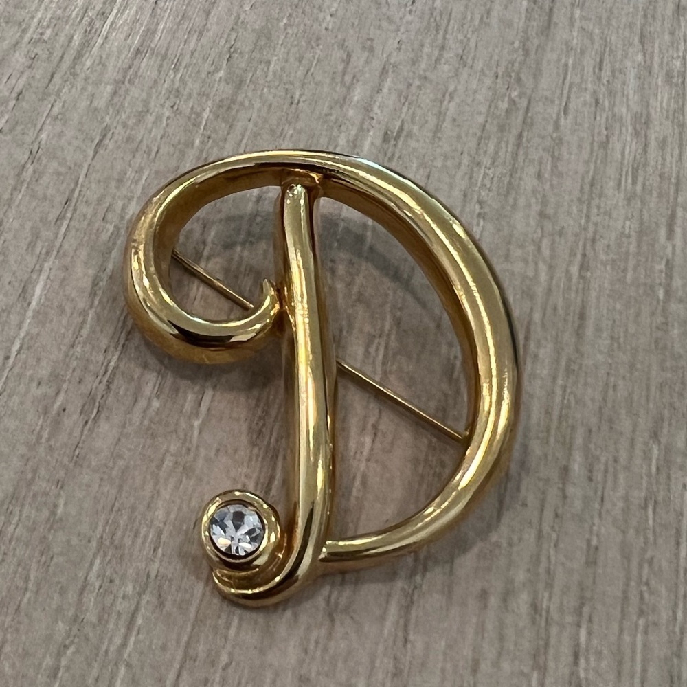 Vintage Monet D letter rhinestone brooch